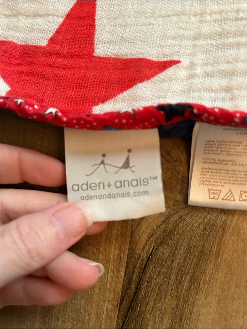 aden + anais Red Star Muslin Baby Blanket on White